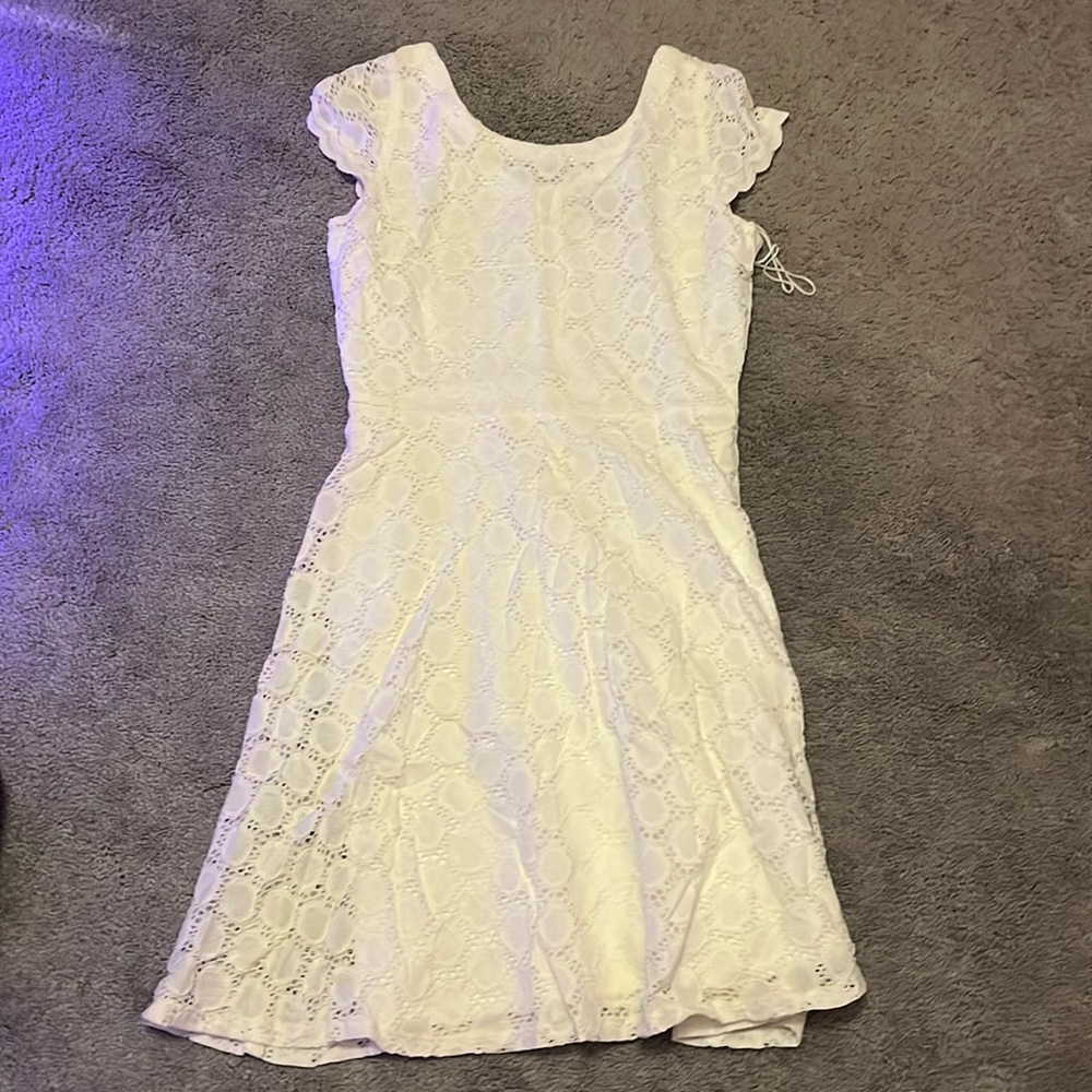 Cute white dress very flowy perfect for a young bridesmaid or flower girl!